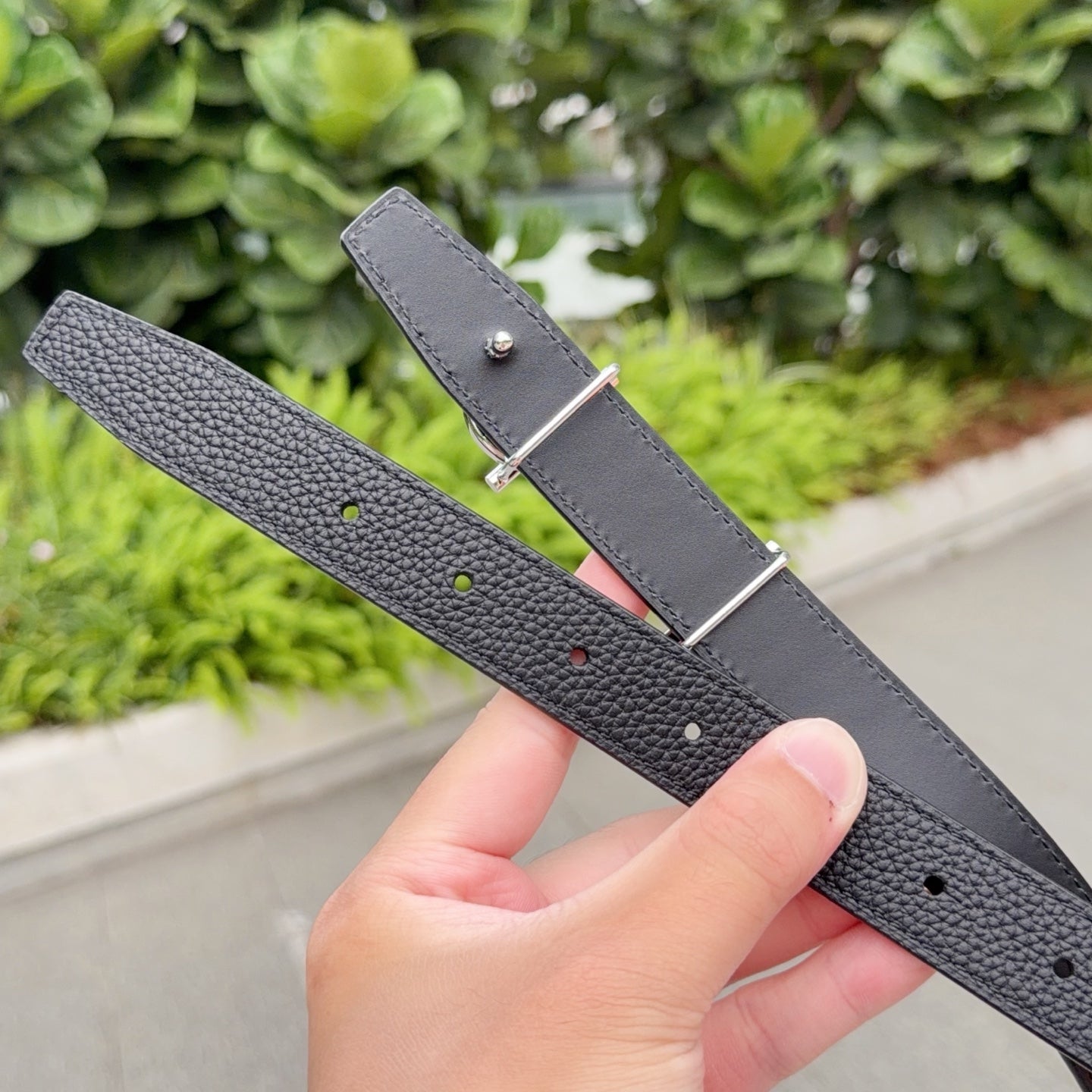 Hermes belt adjustable strap with dark leather and silver-tone buckle bar