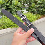 Hermes belt underside with dark leather, rows of holes, and silver-tone buckle ring
