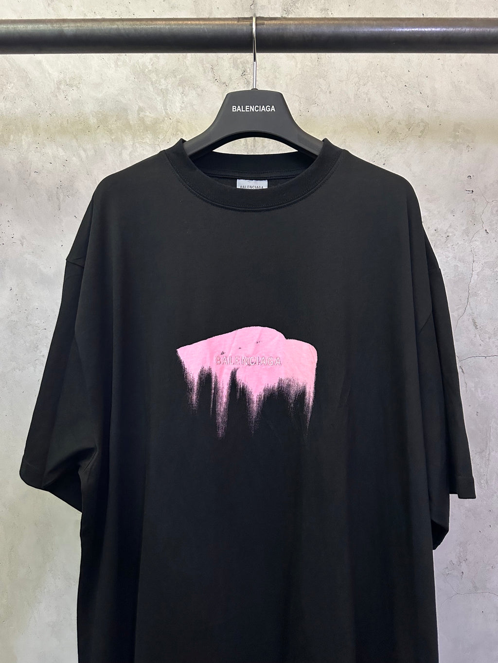 Balenciaga black crewneck T-shirt with pink graphic chest