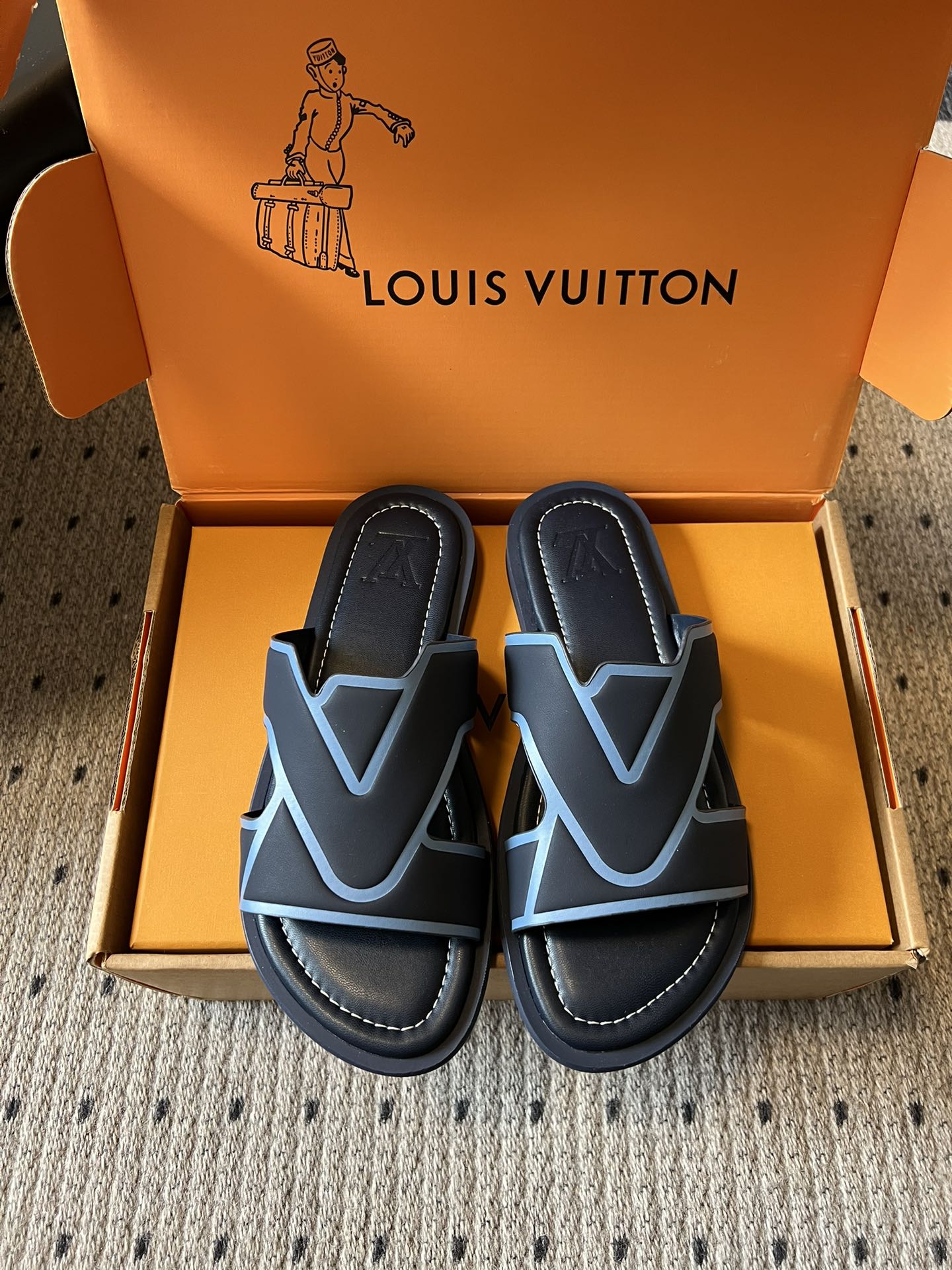 Louis Vuitton slide sandals, black with light blue V logo straps
