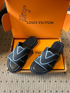 Louis Vuitton slide sandals, black with light blue V-pattern straps, open toe