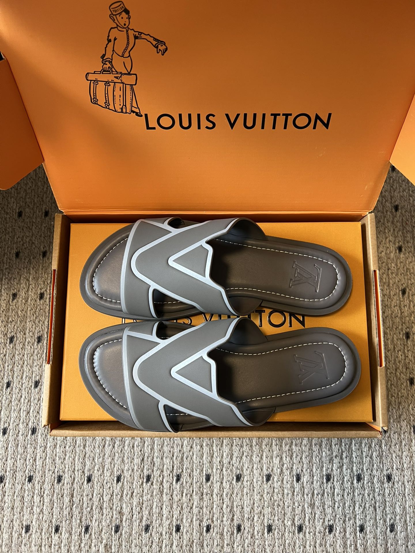 Louis Vuitton slide sandals, dark gray slide footbeds with stitched details, boxed