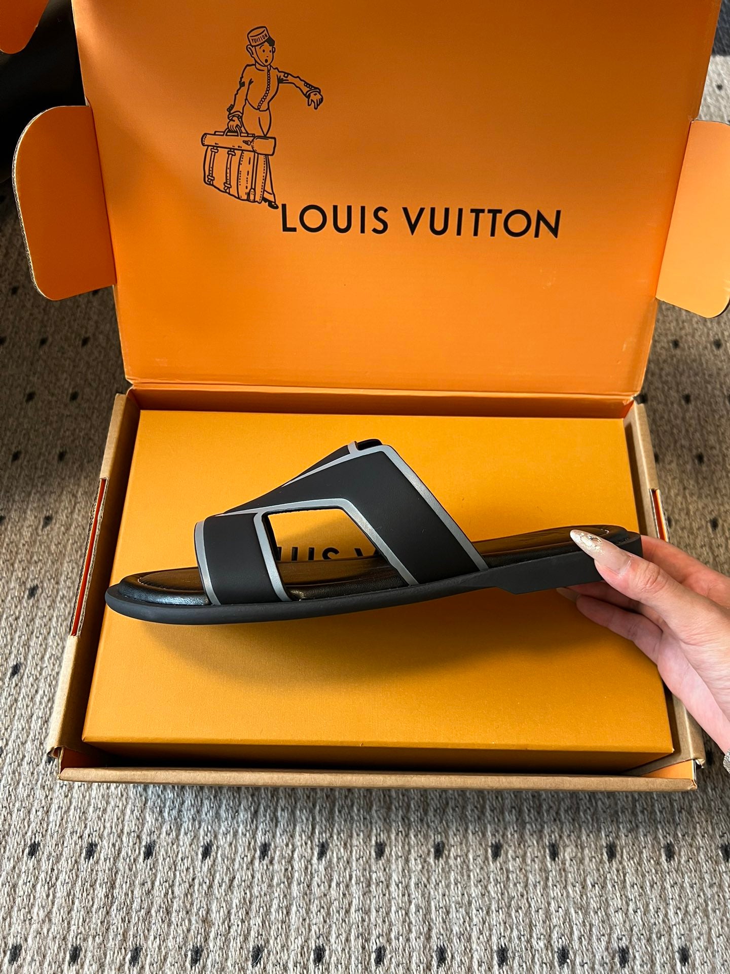 Louis Vuitton slide sandals on box, black with light blue V front strap and open toe