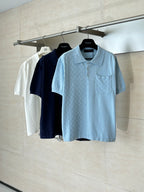 Light blue polo shirt with collar and chest pocket, shown on a hanger