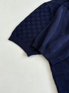 Louis Vuitton dark navy polo shirt sleeve cuff and textured fabric detail