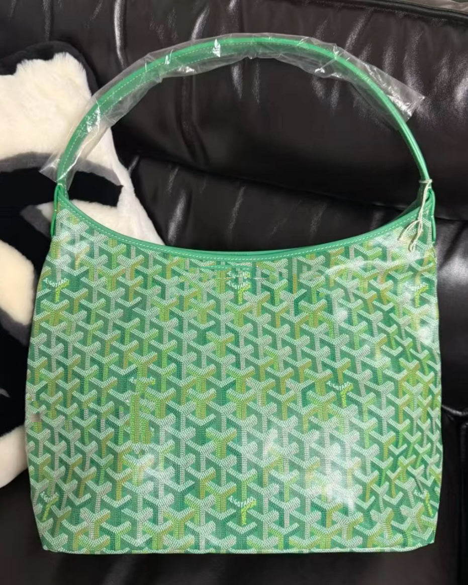 Green lattice-print hobo bag with top handle and open interior