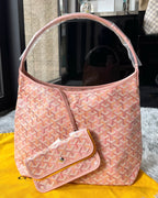 Pink patterned hobo bag with top open mouth and matching crossbody pouch