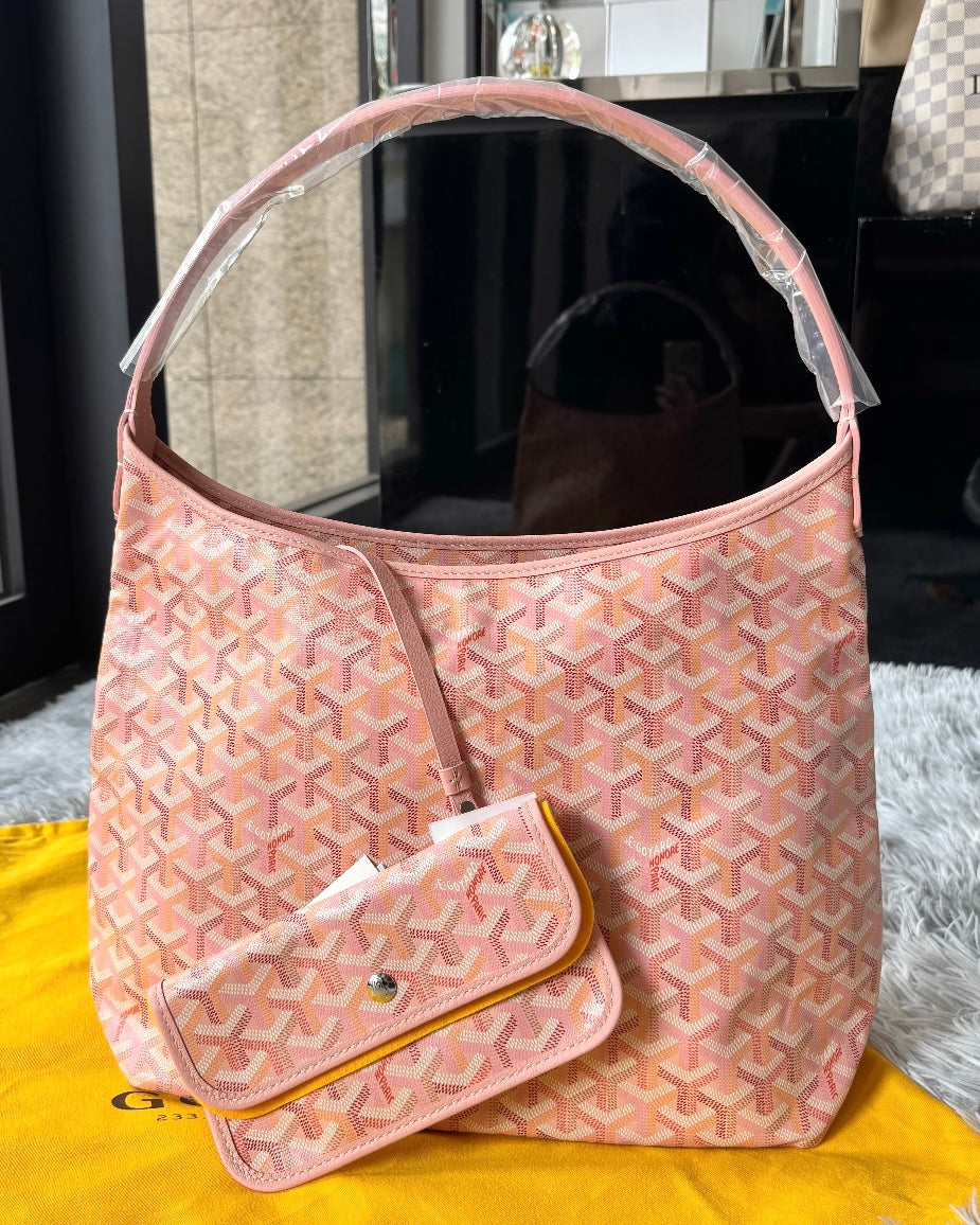 Pink patterned hobo bag with top open mouth and matching crossbody pouch