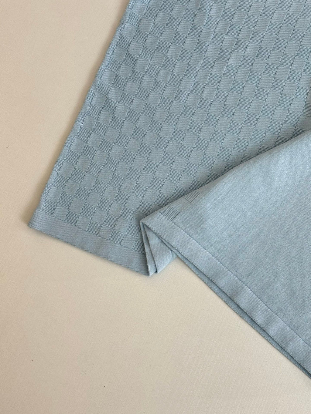 Light blue polo shirt knit fabric with sleeve and straight hem