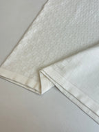 White textured polo sleeve and hem section