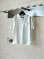 White polo shirt with collar and chest pocket, short sleeves