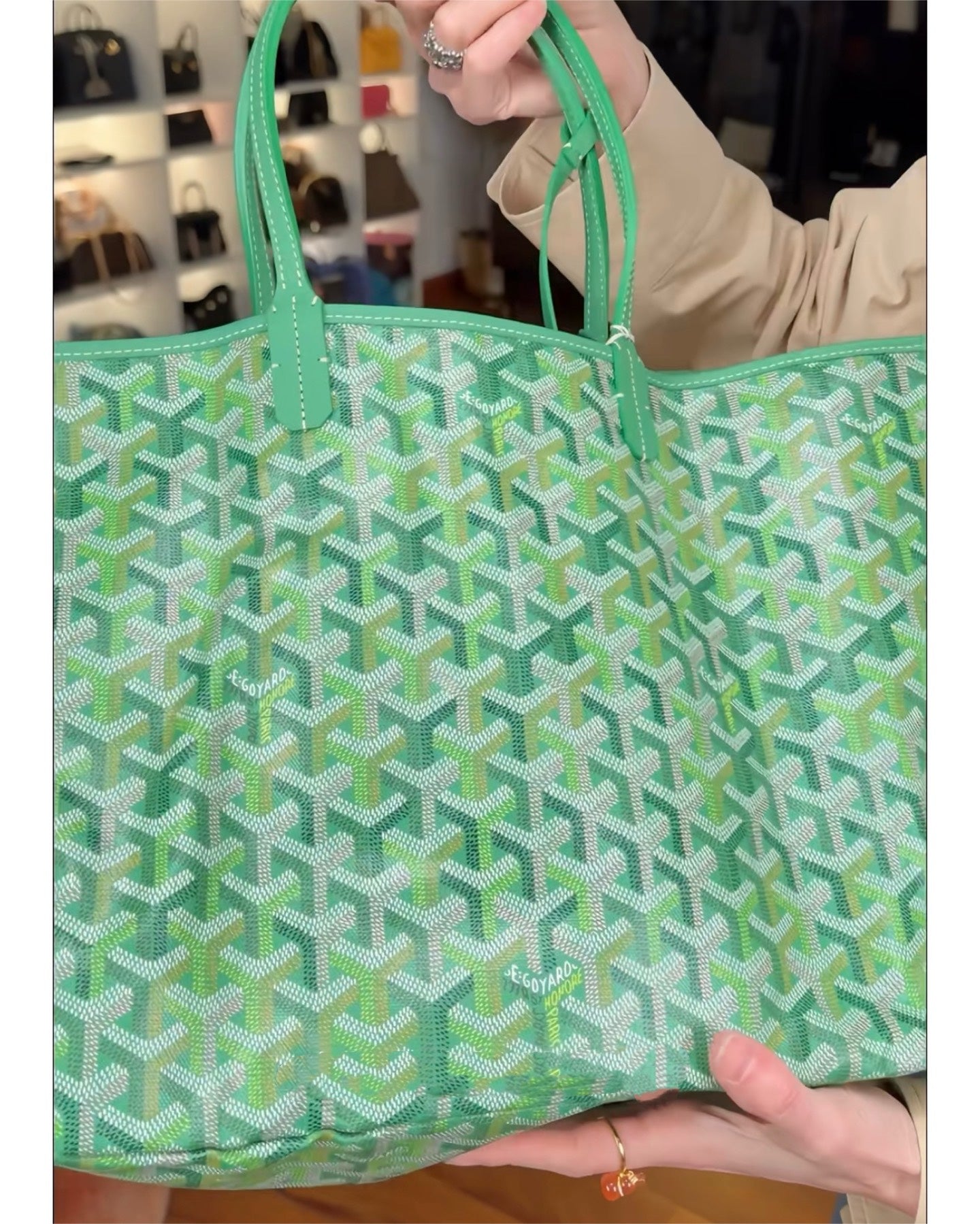 Green patterned tote bag close-up with two handles and open top