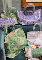 Assorted patterned tote bags in green, lavender, and pink