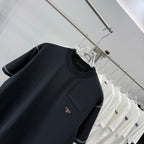 Prada short-sleeve T-shirt, dark navy, logo patch on chest pocket, crew neck