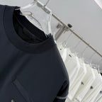 Prada short-sleeve T-shirt neckline, dark navy crew neck with chest pocket logo