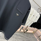 Prada short-sleeve T-shirt, dark navy, stitched hem trim, logo patch and chest pocket