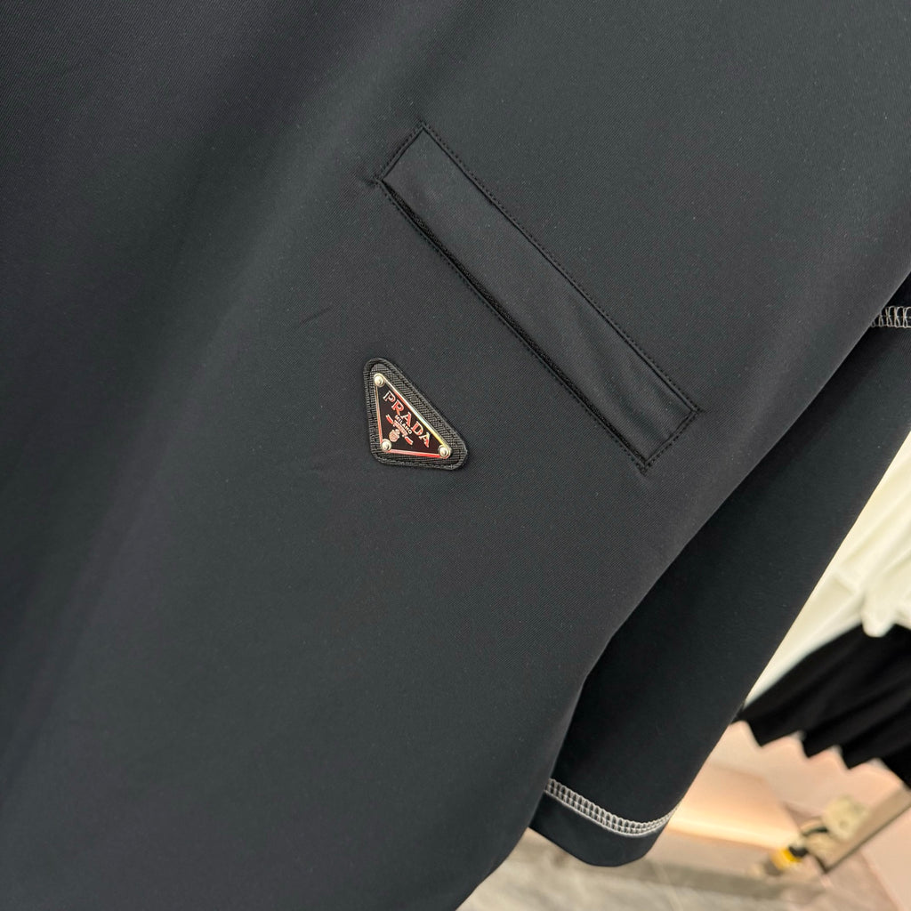 Prada short-sleeve T-shirt chest pocket, dark navy fabric with Prada logo patch