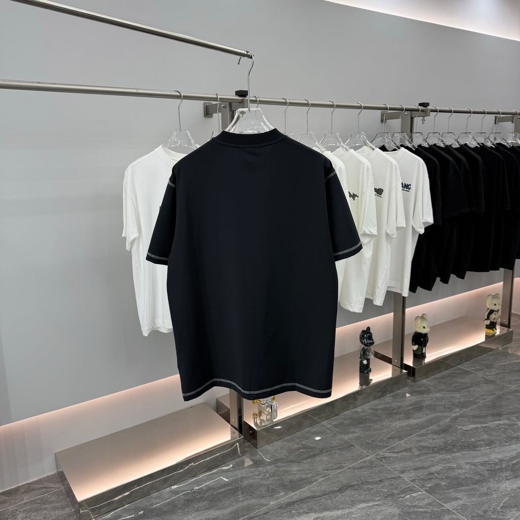 Prada short-sleeve T-shirt, dark navy, crew neck, chest pocket, logo patch
