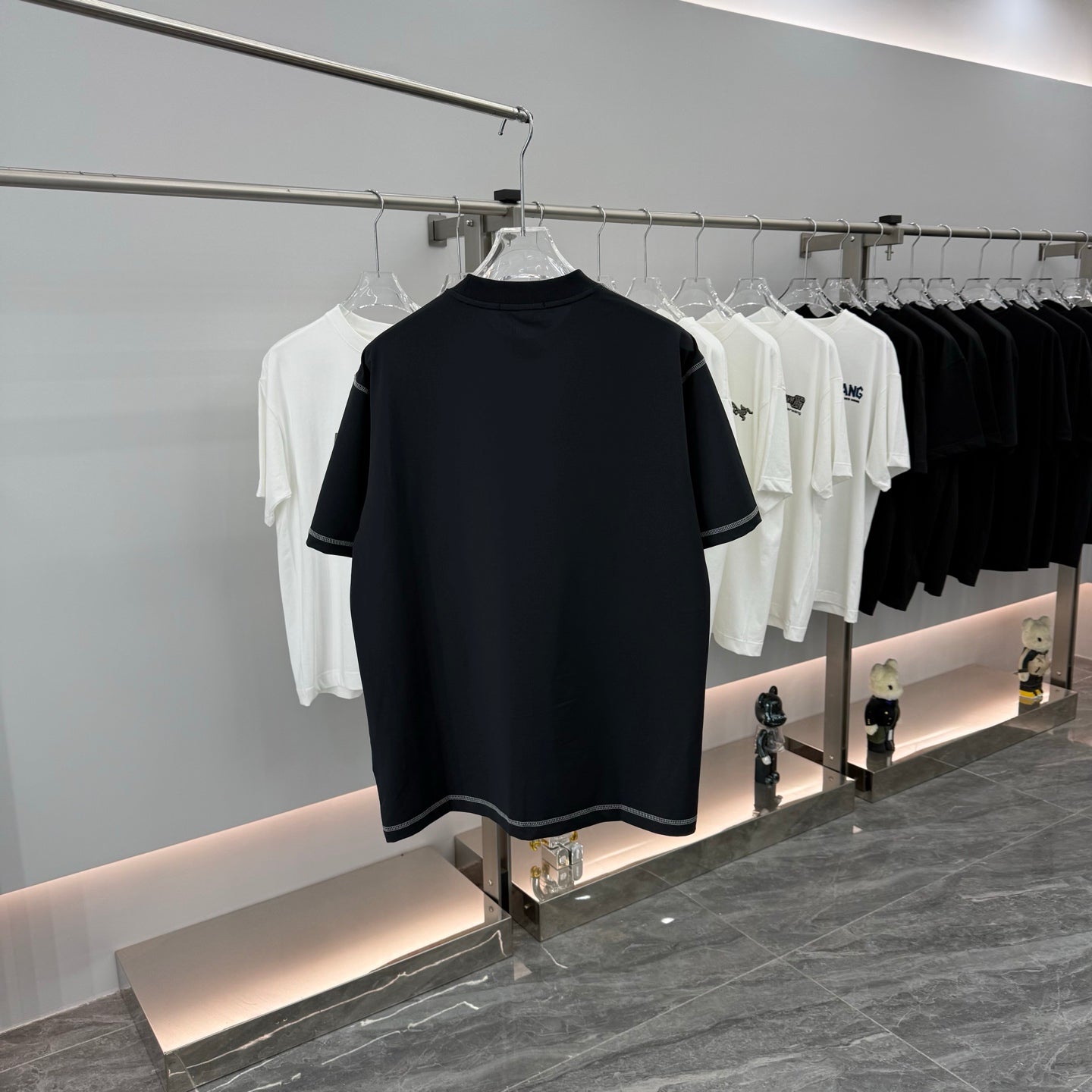 Prada short-sleeve T-shirt, dark navy, crew neck, chest pocket, logo patch