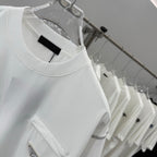 White crewneck T-shirt neckline with black label and small chest pocket