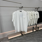 White short-sleeve T-shirt with crew neck and chest pocket on a display hanger