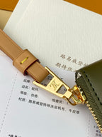 Louis Vuitton small leather bag with brown strap and gold clasp, front emblem hardware