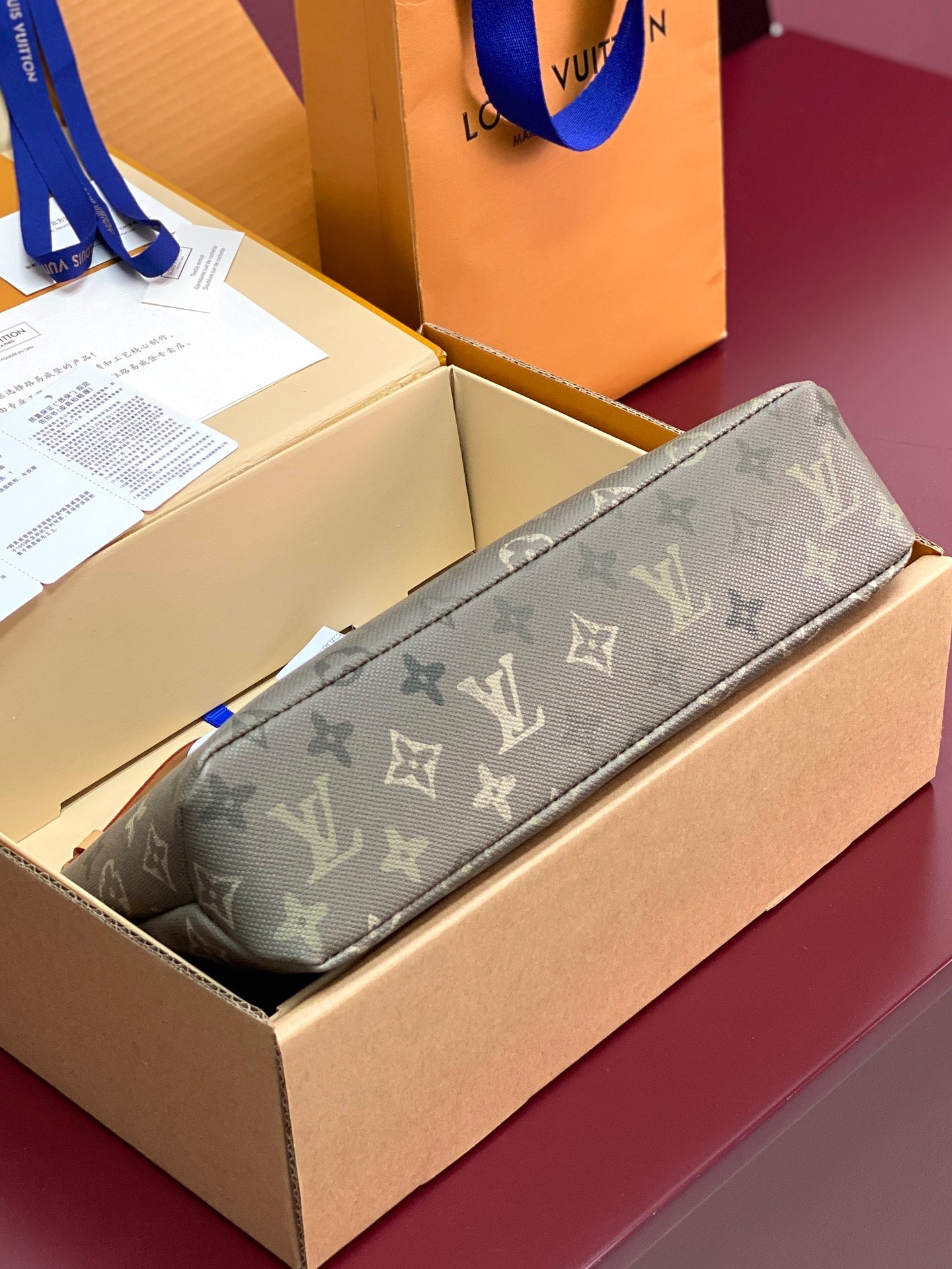 Louis Vuitton small monogram bag in box, dark olive green, top zip closed
