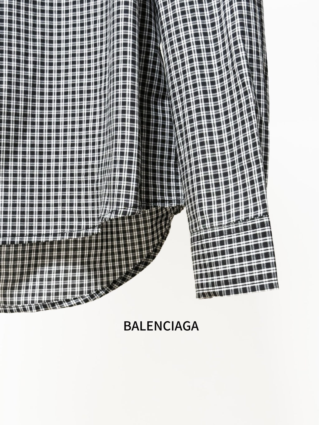 Checkered button-up shirt curved hem and long sleeves