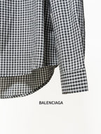 Checkered button-up shirt curved hem and long sleeves