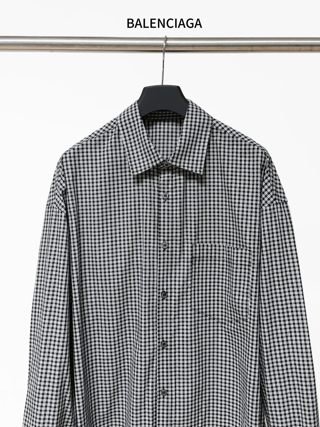 Checkered button-up shirt with long sleeves and button-front placket