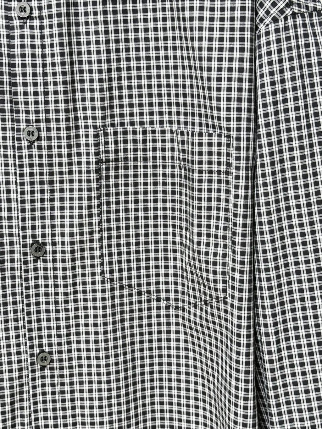 Checkered shirt front panel with button placket and patch pocket