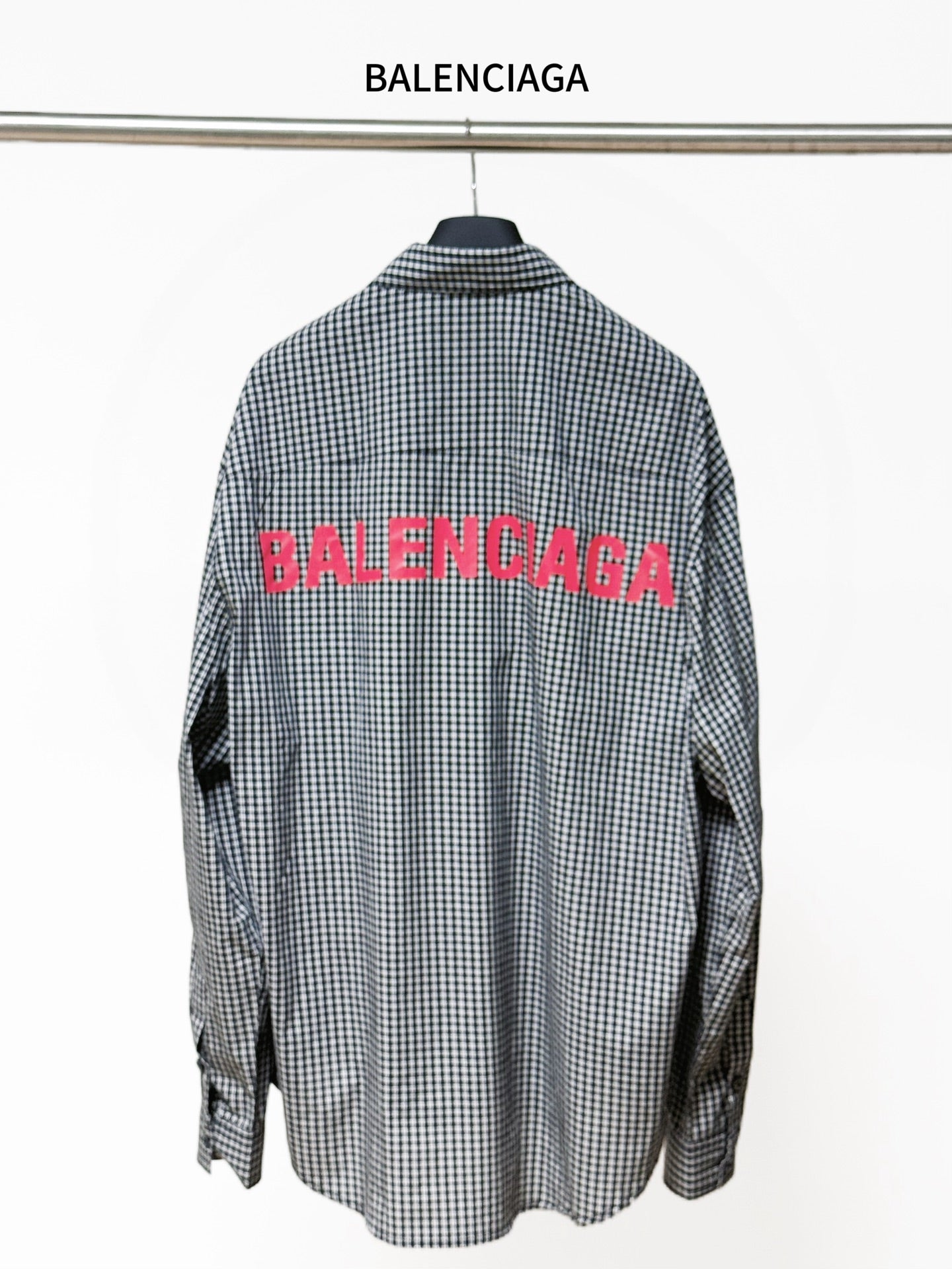 Checkered button-up shirt with BALENCIAGA text graphic on the back