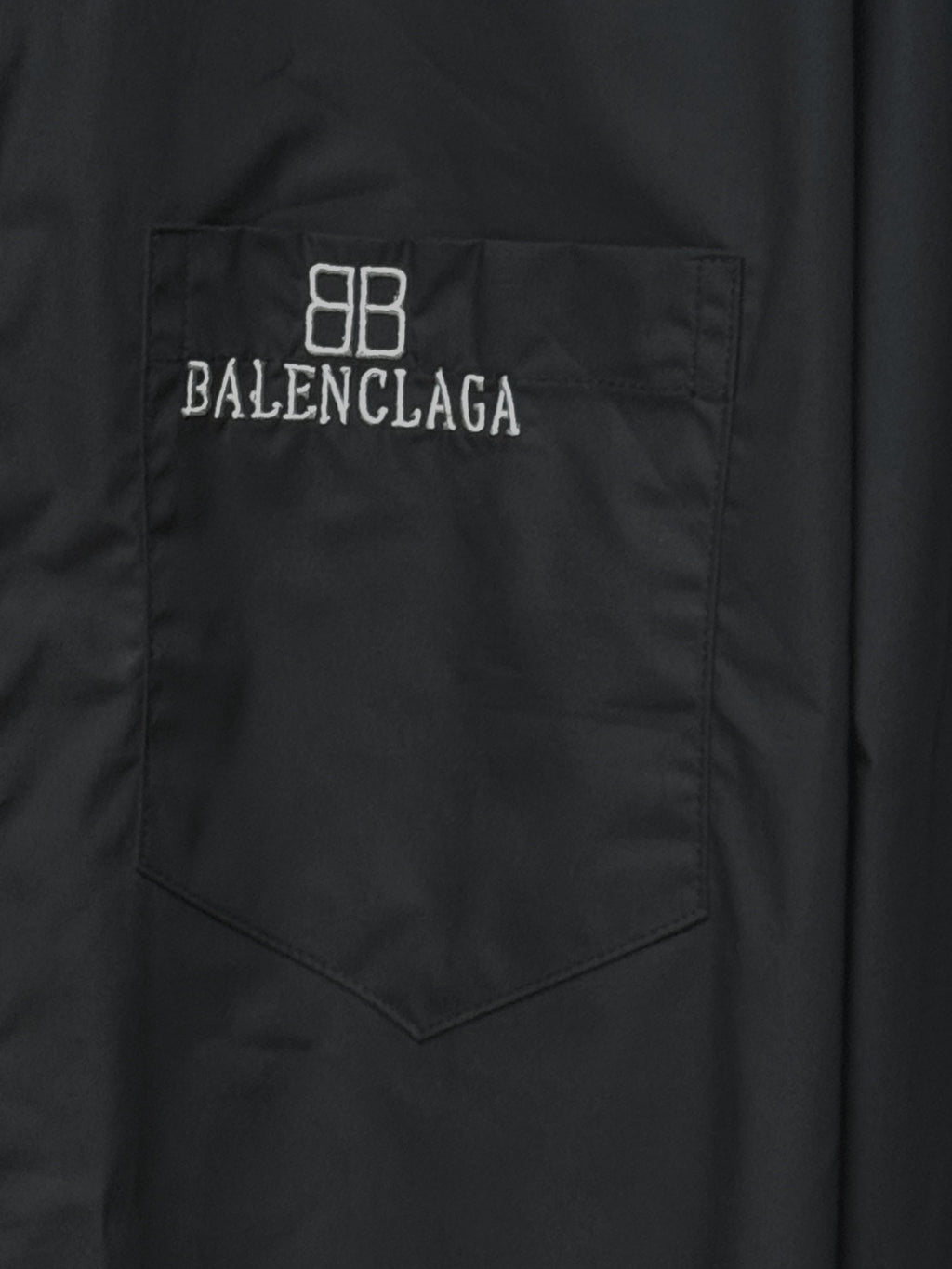 Dark shirt chest pocket with embroidered 8B and BALENCIAGA text