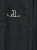 Dark shirt chest pocket with embroidered 8B and BALENCIAGA text