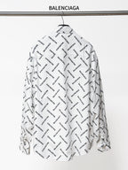 White long-sleeve button-up shirt, back view, with black Balenciaga logo allover print