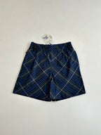 Navy plaid shorts with elastic waistband and front pleats, blue and tan check pattern