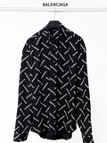 Black long-sleeve button-up shirt with allover Balenciaga logo print and pointed collar