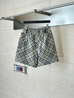 Plaid pants with elastic waist and drawstring, beige with blue and black checks