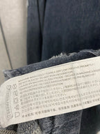 Denim jacket care label with washing and drying instructions