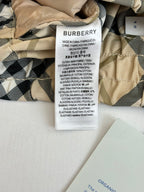 Burberry pants care label on check fabric waistband