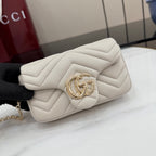 Small quilted shoulder bag with chevron stitching and Gucci Double G front clasp