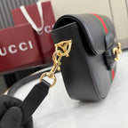 Gucci shoulder bag with black leather strap and gold-tone keyring hardware