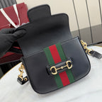 Gucci crossbody bag close front view with black leather, green and red stripe, gold clasp