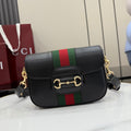 Gucci small crossbody bag with black leather, green and red stripe, gold clasp, chain strap