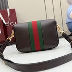 Dark brown leather crossbody bag with Web stripe band and gold tone chain strap