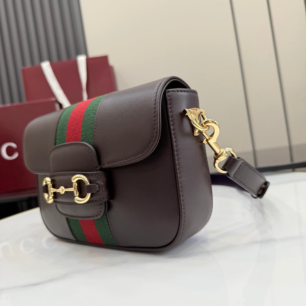 Dark brown leather shoulder bag with Web stripe, gold clasp and chain strap