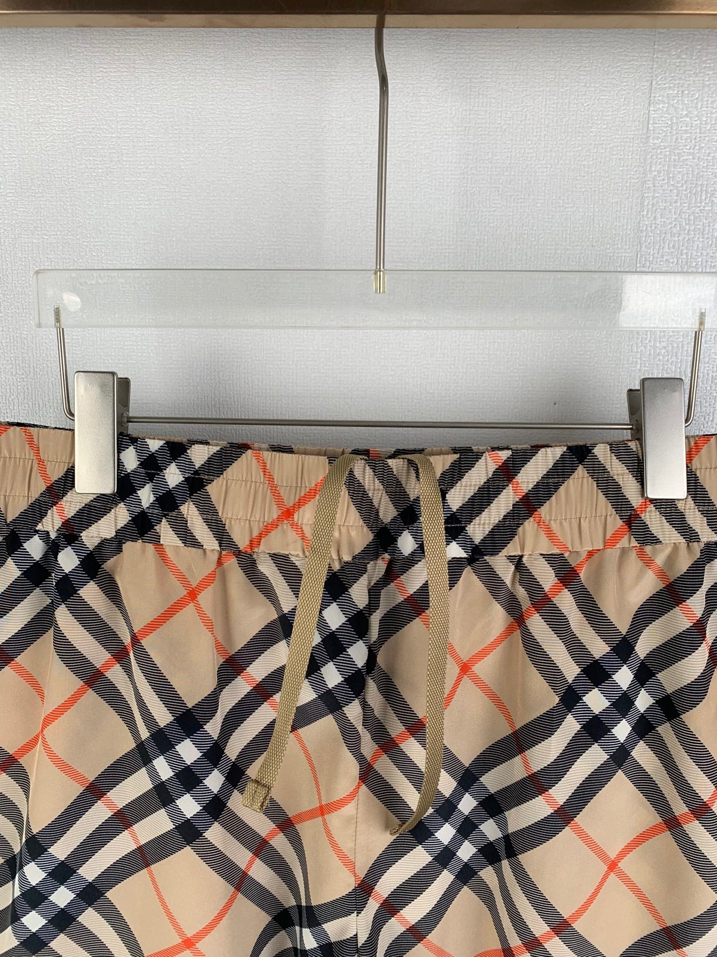 Burberry plaid pants waistband with drawstring and beige navy red checks
