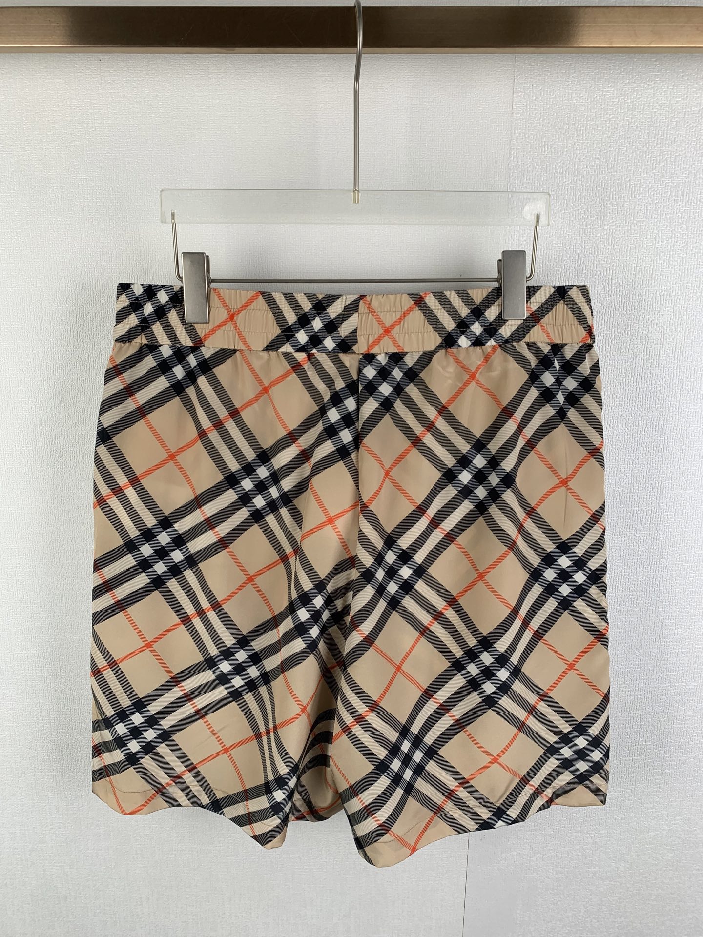 Burberry plaid pants with elastic waist and beige, navy, red grid pattern