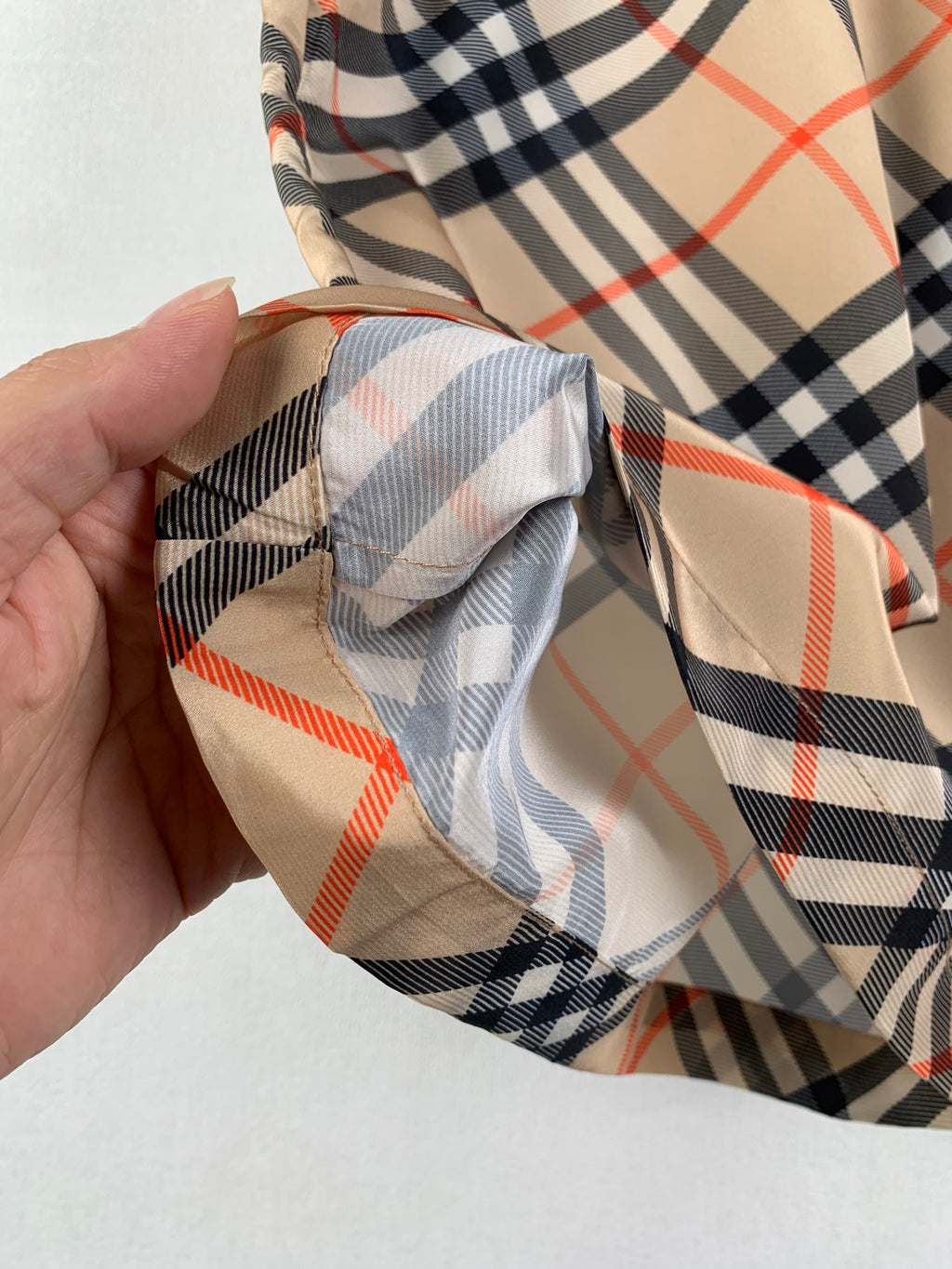 Burberry plaid pants cuff detail in beige with navy and red checks