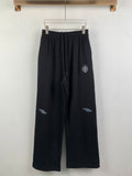 Balenciaga pants with elastic waist, dark wide-leg track style and drawstring